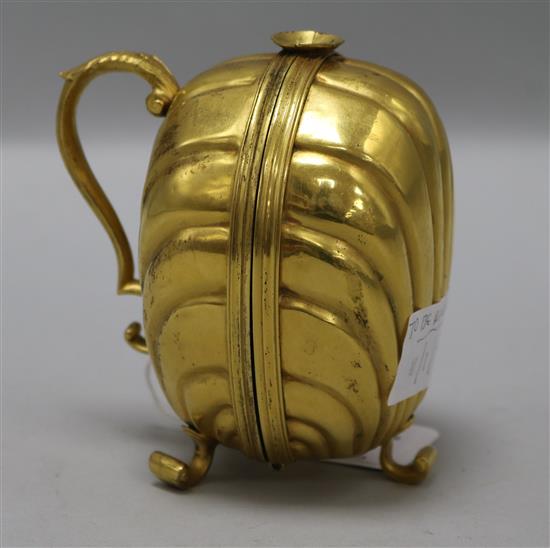 A German gilt brass wax jack, 18th century